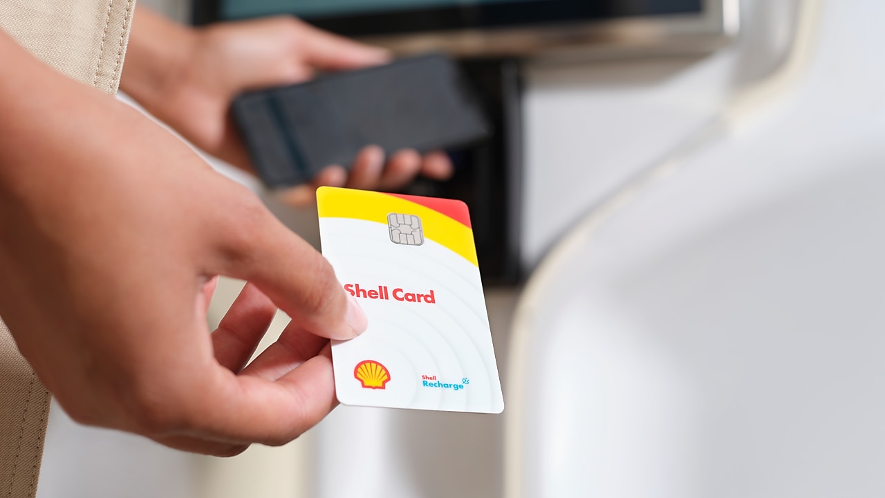 Shell card in hand