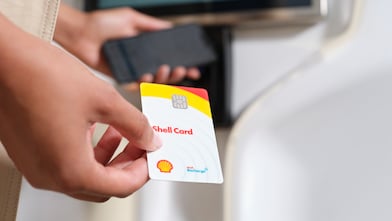 Shell card in hand