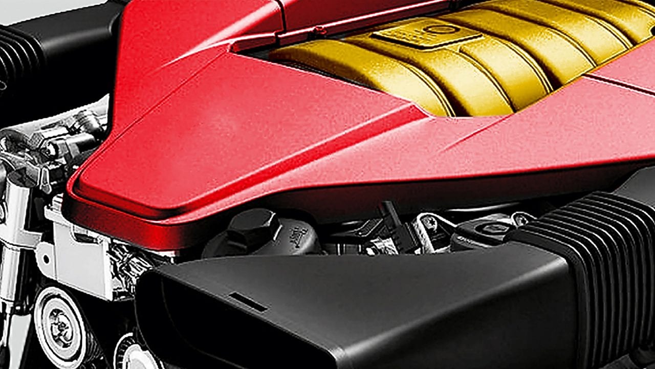 Le moteur d'une voiture, doré au centre, avec une bordure rouge