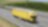Blue sky over yellow truck on a highway