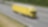 Blue sky over yellow truck on a highway