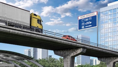 trade banner truck car on bridge road services sign