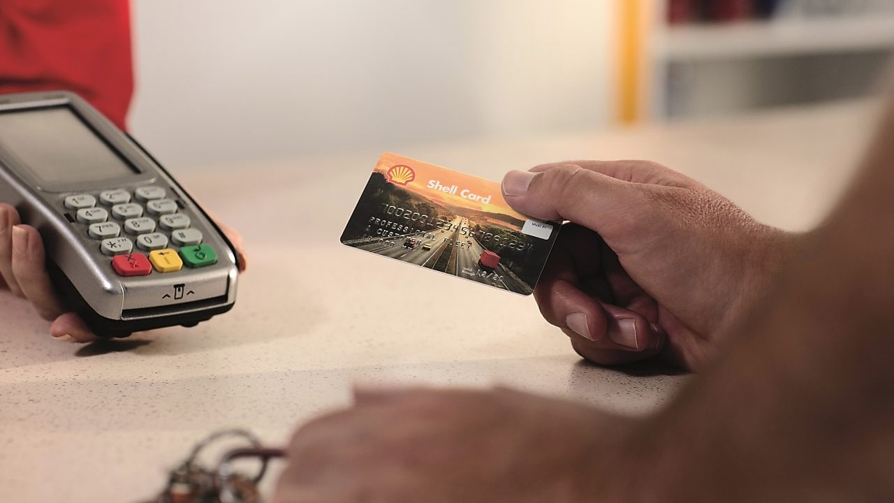 person with shell card