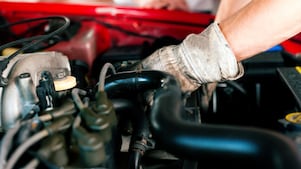 Car mechanic in repair shop
