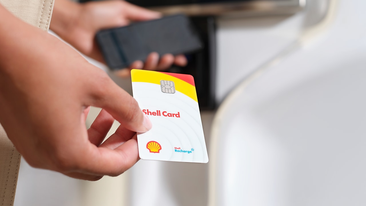 Shell card in hand