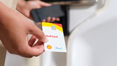 Shell card in hand