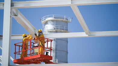 Engineers on crane maintenance work